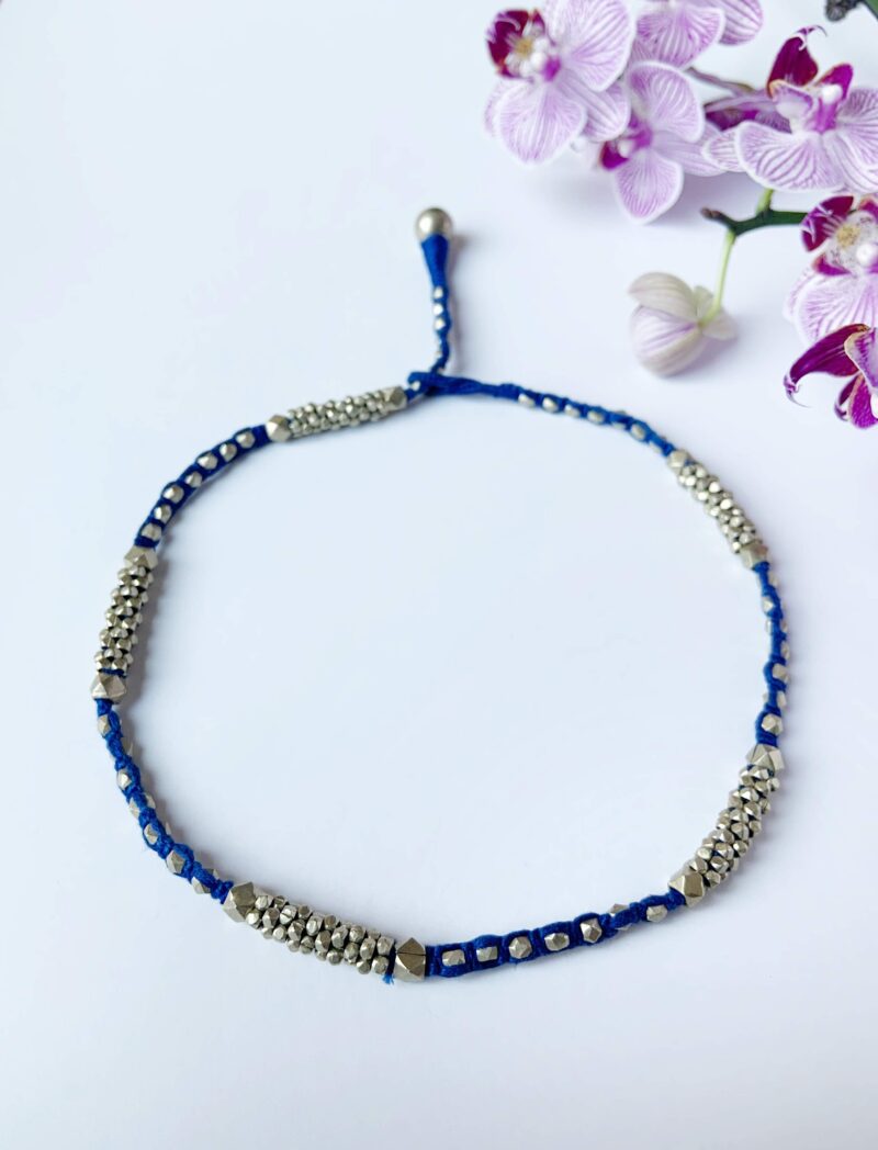 Threads of Tradition: Blue and Silver Bracelet